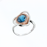 Women's ring with topaz and diamonds 