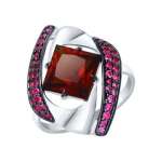 Women's ring with red sitall and zirconia 