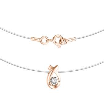Necklace on a fishing line and pendant made of gold with a diamond 